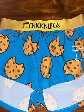 Chicknlegs Women's Blue Cookie-Print Athletic Shorts with Gold Waistband